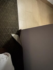 The carpet isn’t even fully installed.