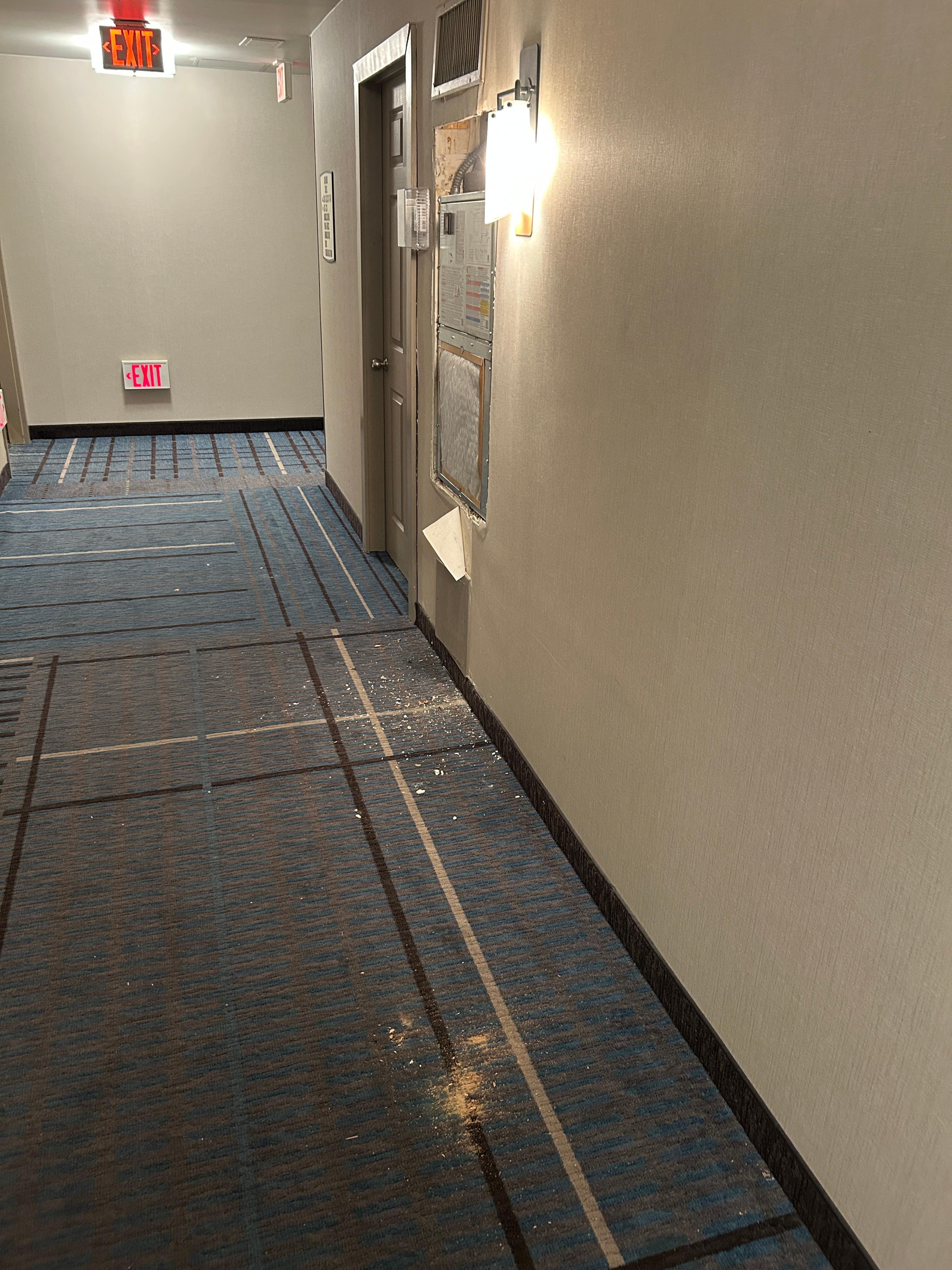 Maintenence left several areas dirty like this throughout this nasty hotel. Room was half-ars clean and the parking situation was a total crock.