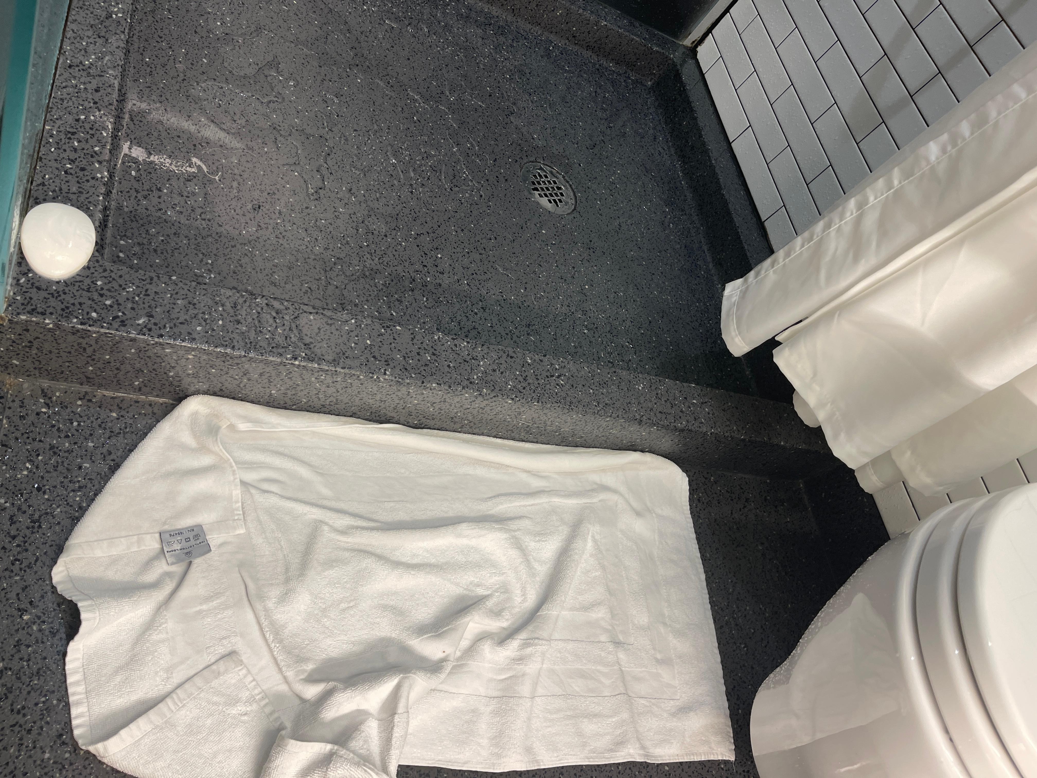 Shower curtain too short, so you step out on a wet floor mat!! 