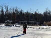 Walking to ice house.