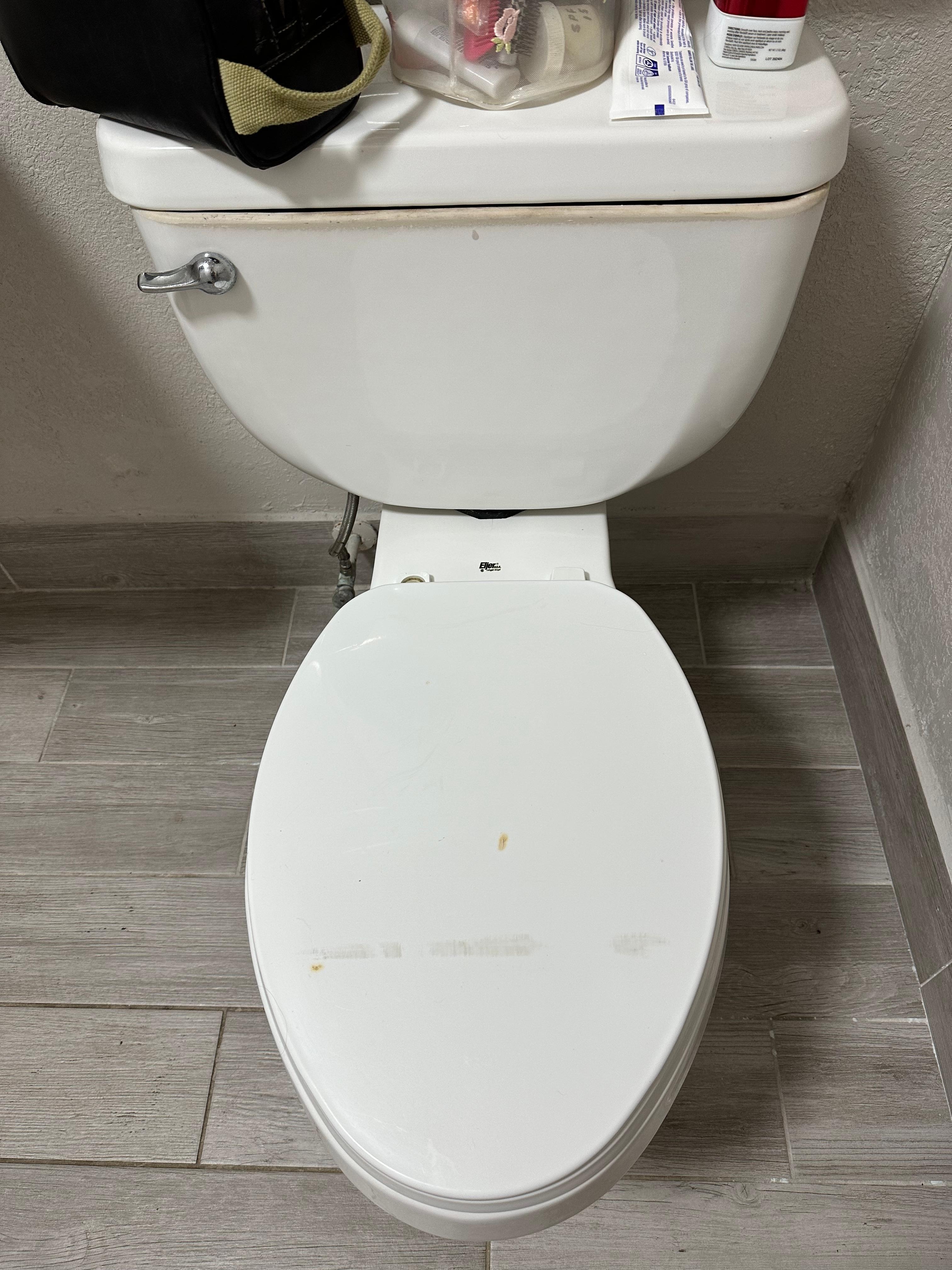 Dirty top. Mismatched tank cover