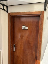 Cracked door frame and door sign