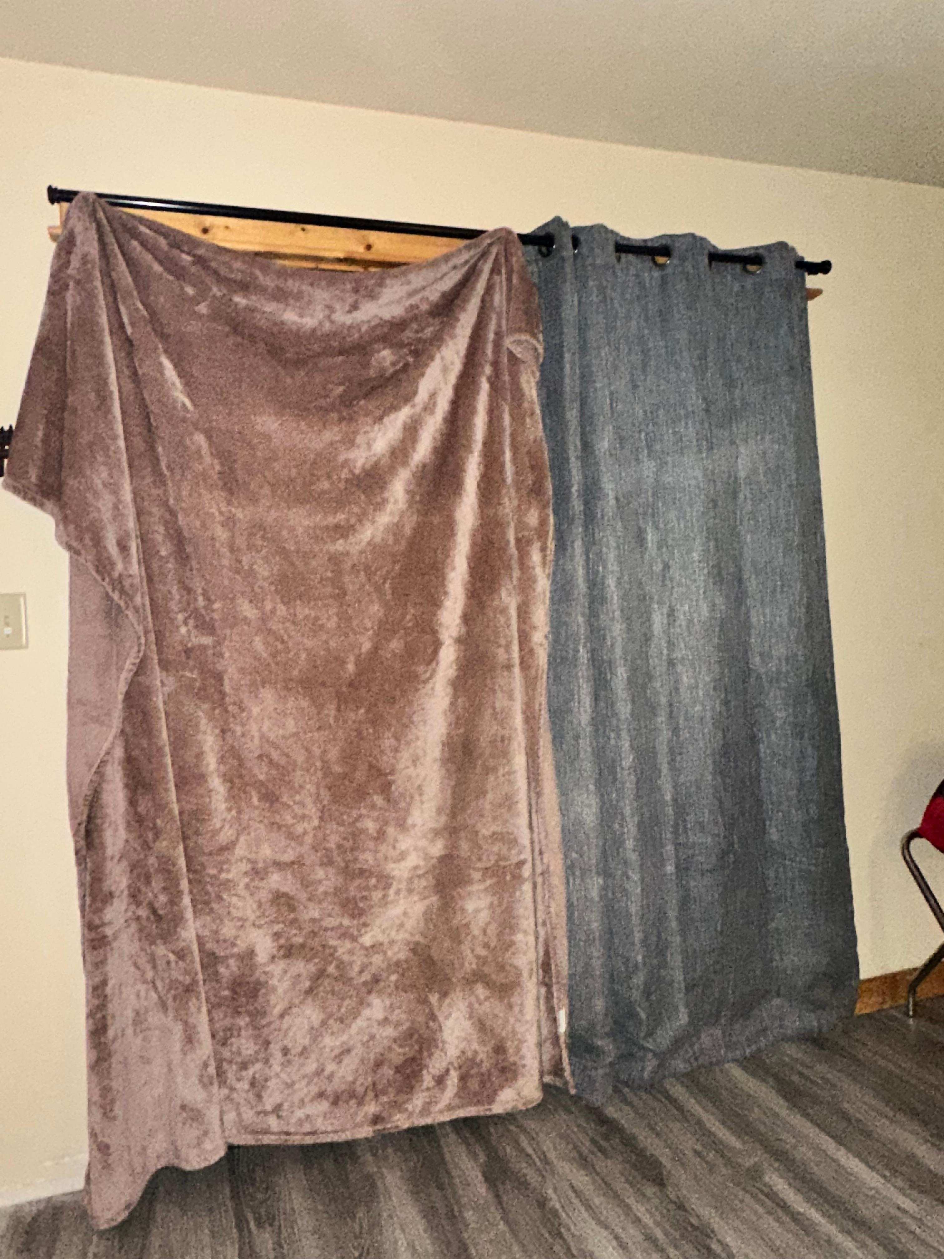 The main door with half curtain, we hung a blanket to cover the rest