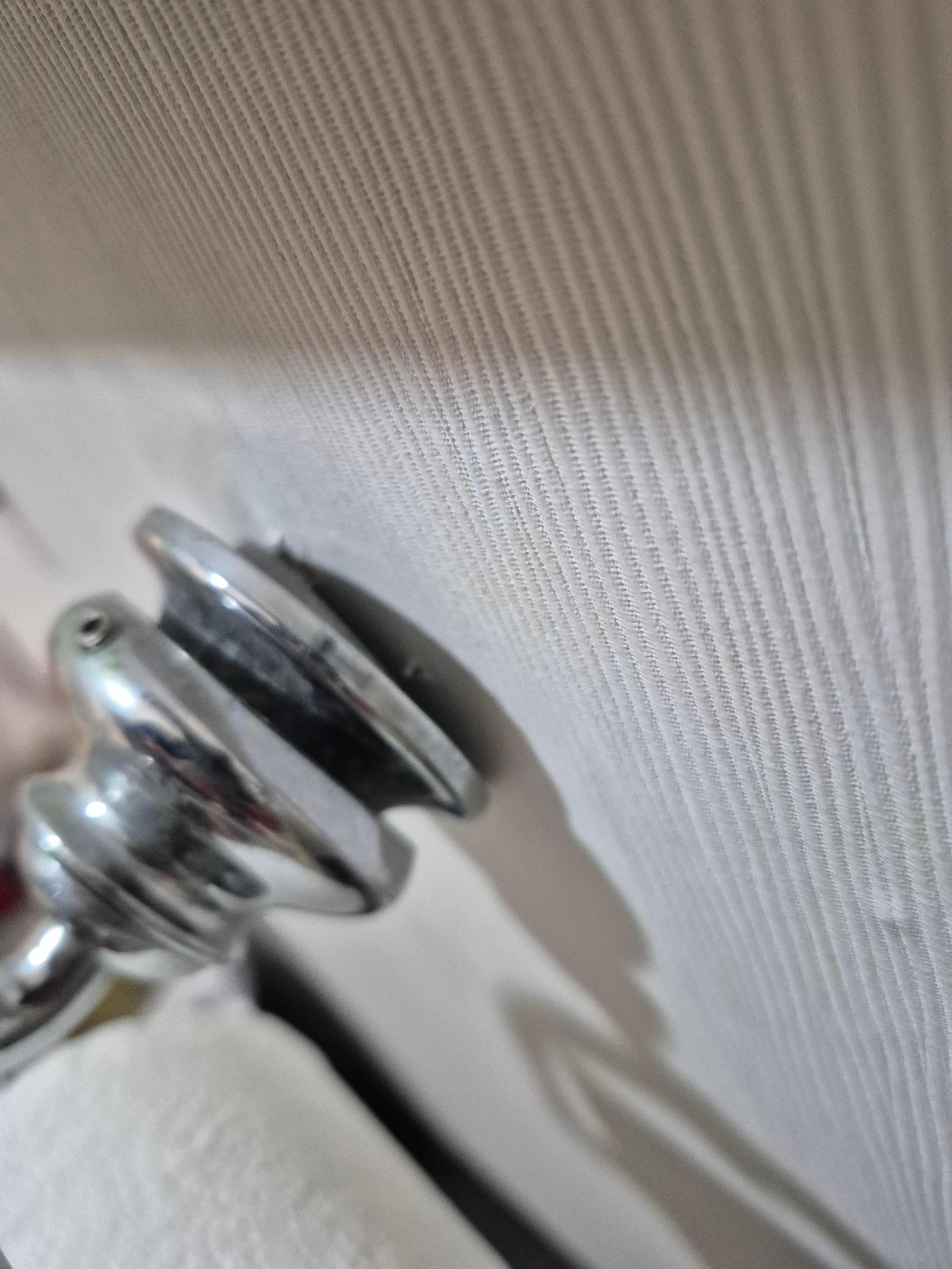 Toilet paper holder fallen off wall--