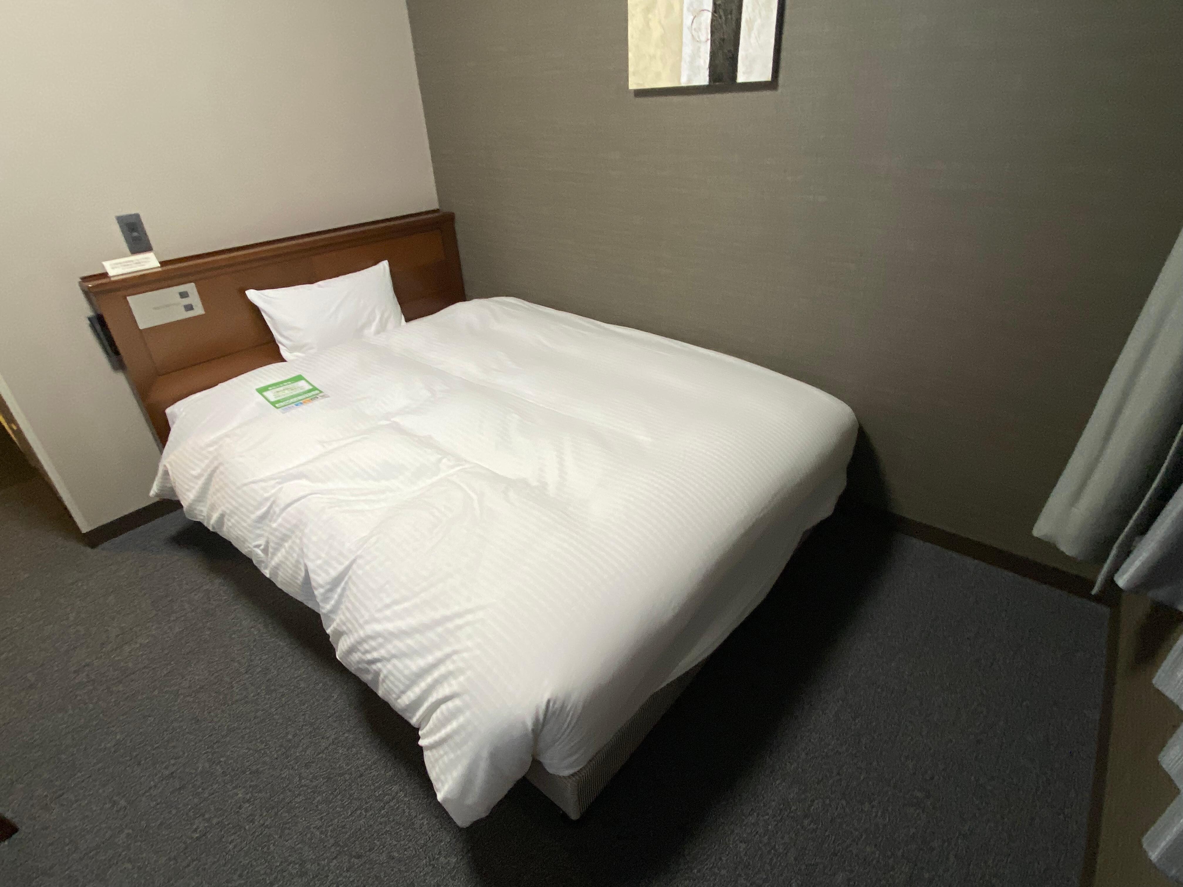 ベットメイキングも綺麗にされていて疲れた身体を癒せる