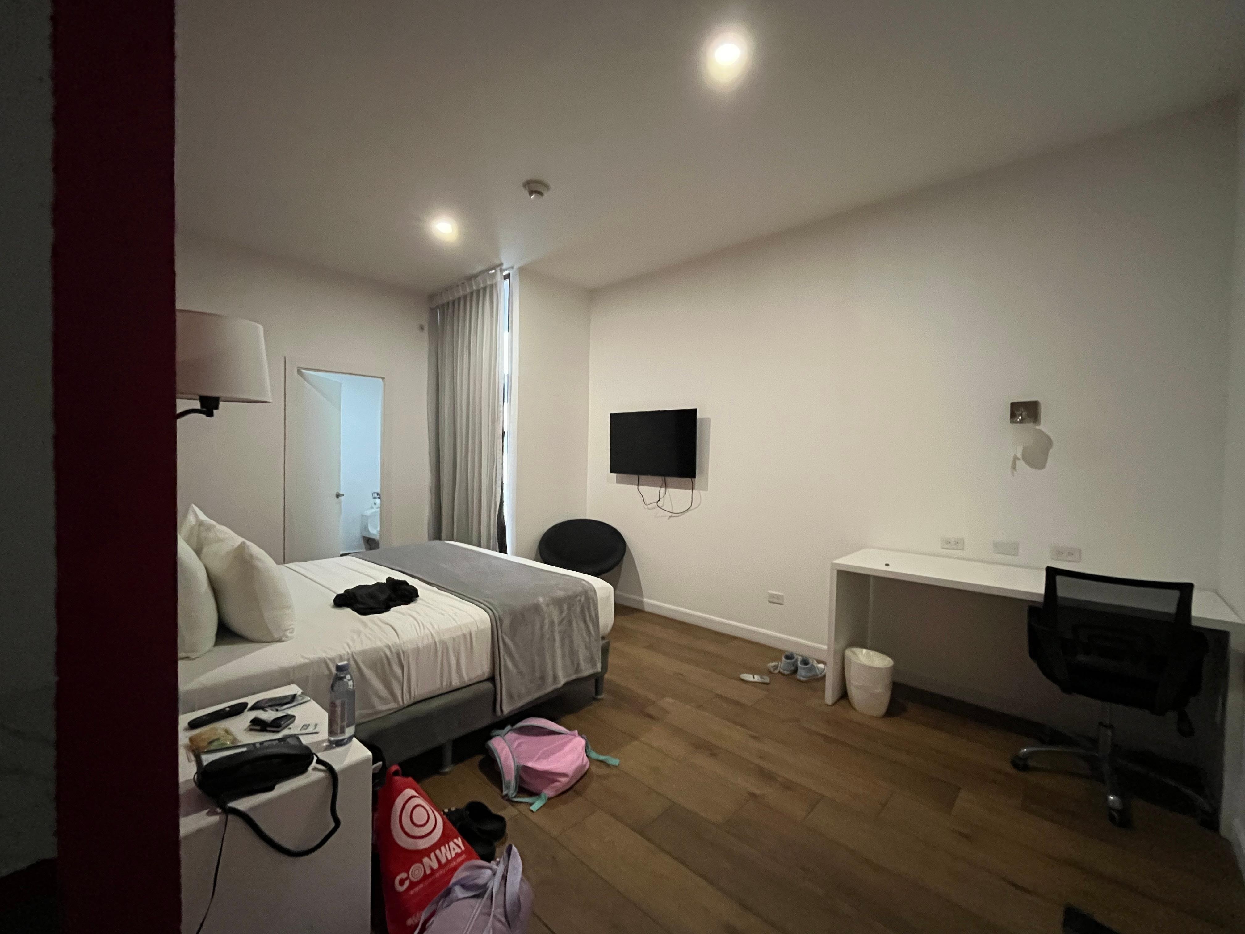 “Deluxe” King room. Much room. Such under-utilized space.