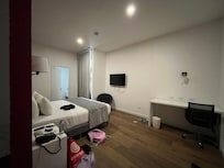 “Deluxe” King room. Much room. Such under-utilized space.