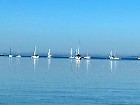 Boats at the beach by the house