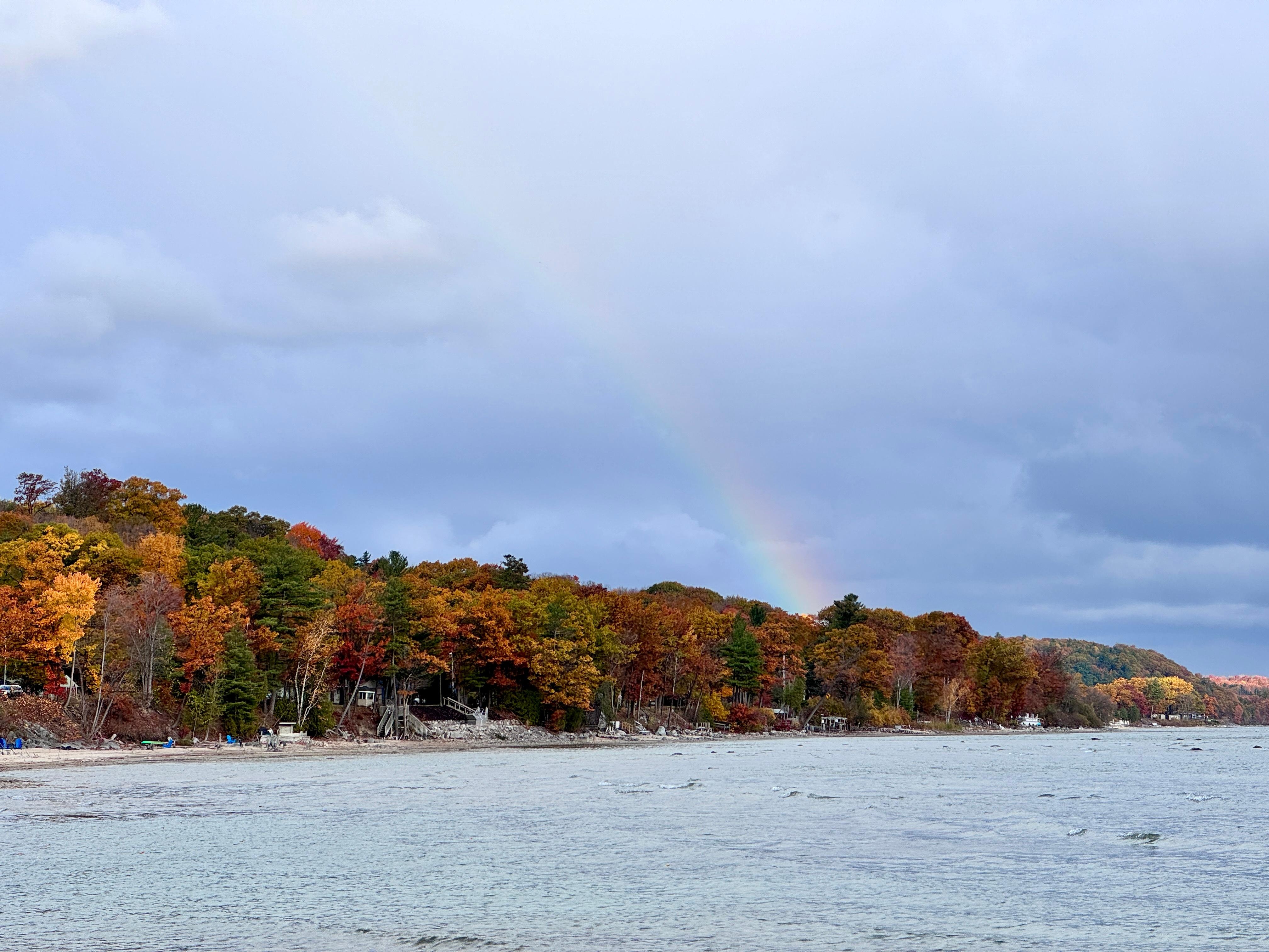 A rainy morning over the bay with some fall colors and a rainbow!