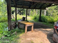 Camp without setup. Table, chairs, and wood provided by host.