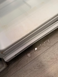 Leak under refrigerator