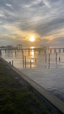 Sunset off the shared dock at the bay