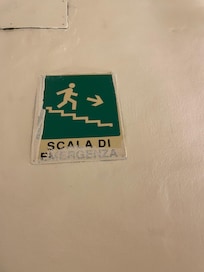 Painted over the emergency signs.