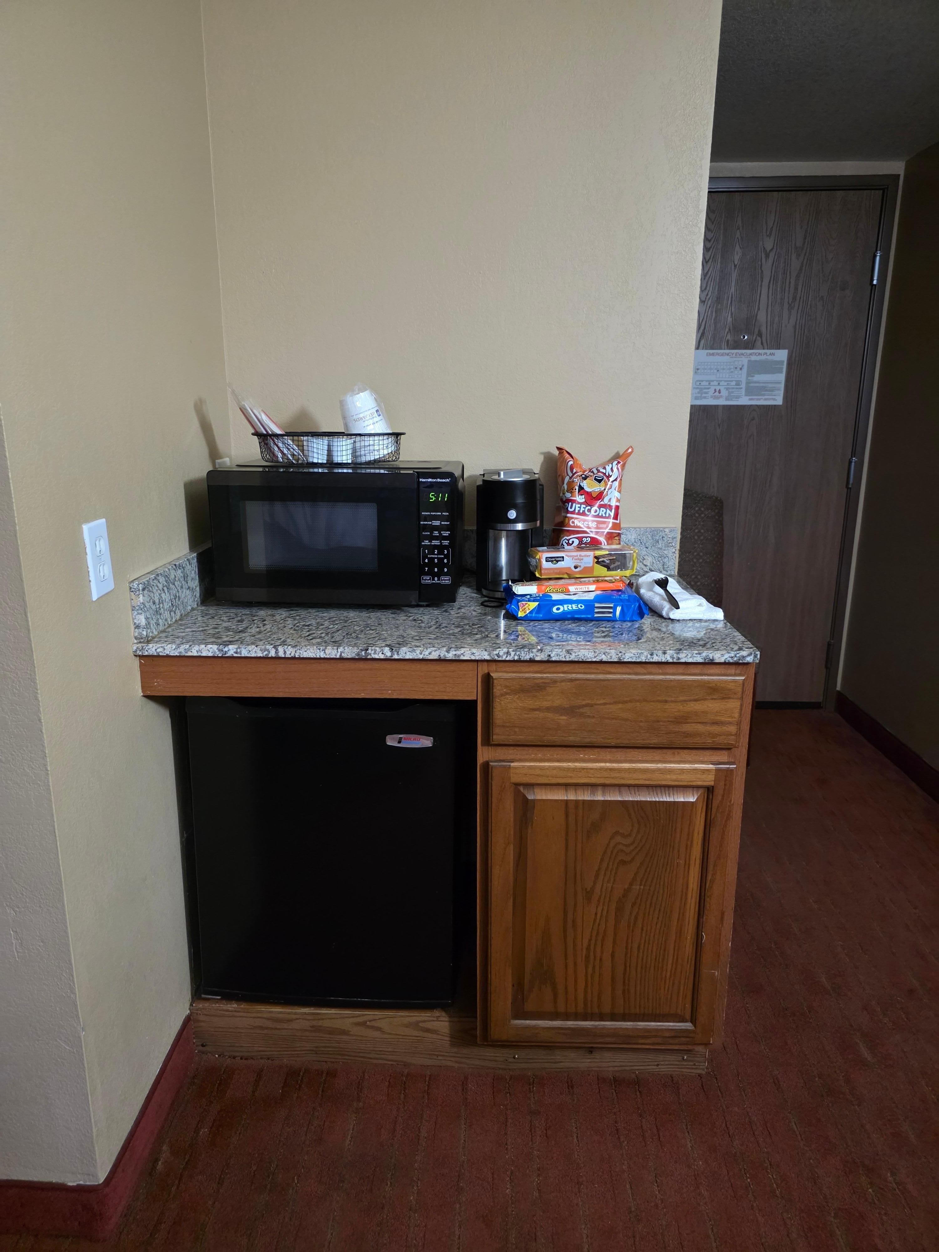 Mini fridge and microwave plus coffee pot