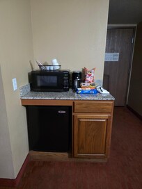 Mini fridge and microwave plus coffee pot