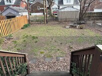 Back yard - little grass - mostly dirt/mud