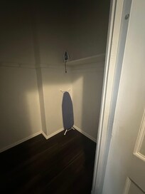 Large closet with ironing board