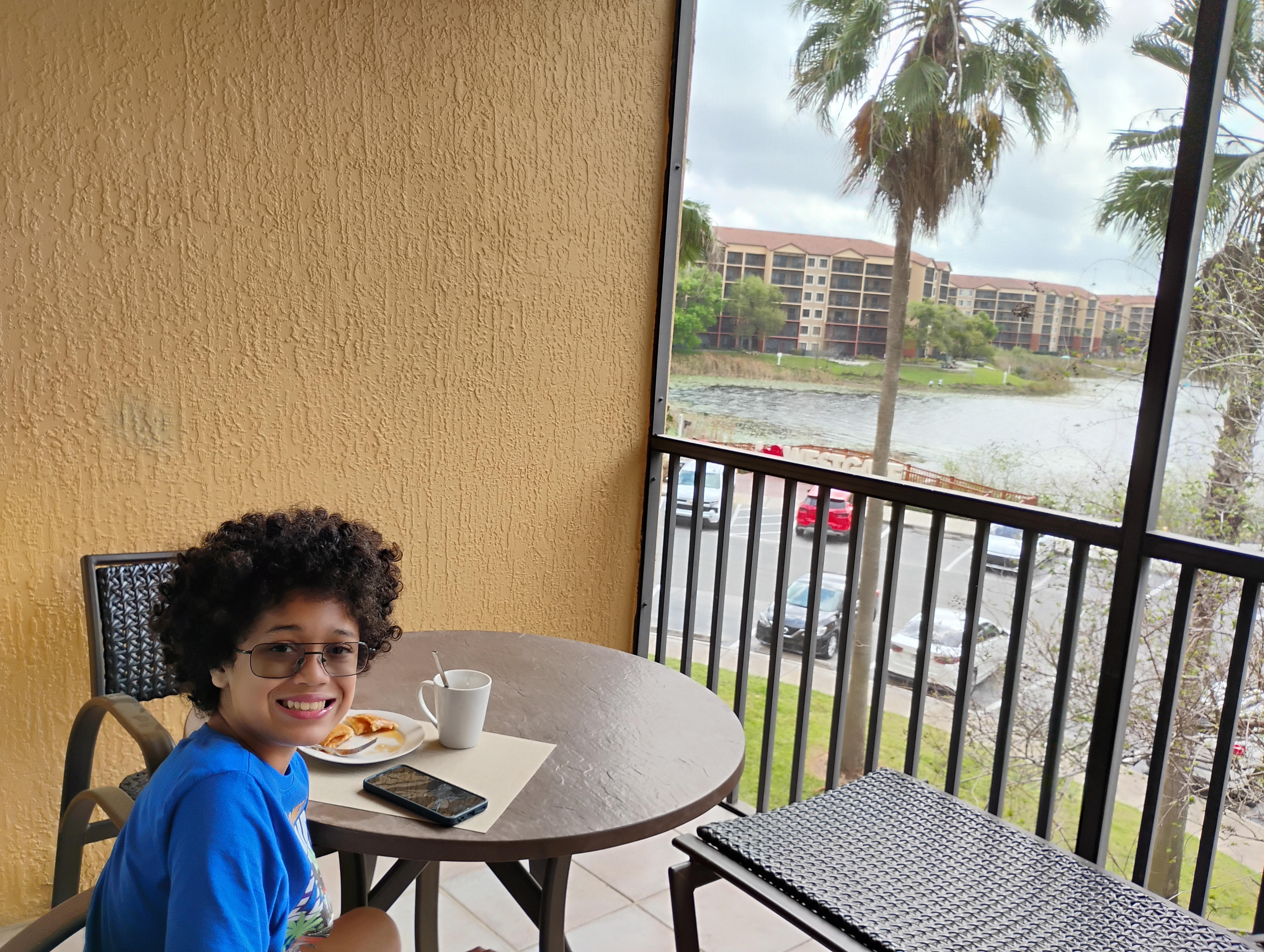 My son loves breakfast at the balcony 