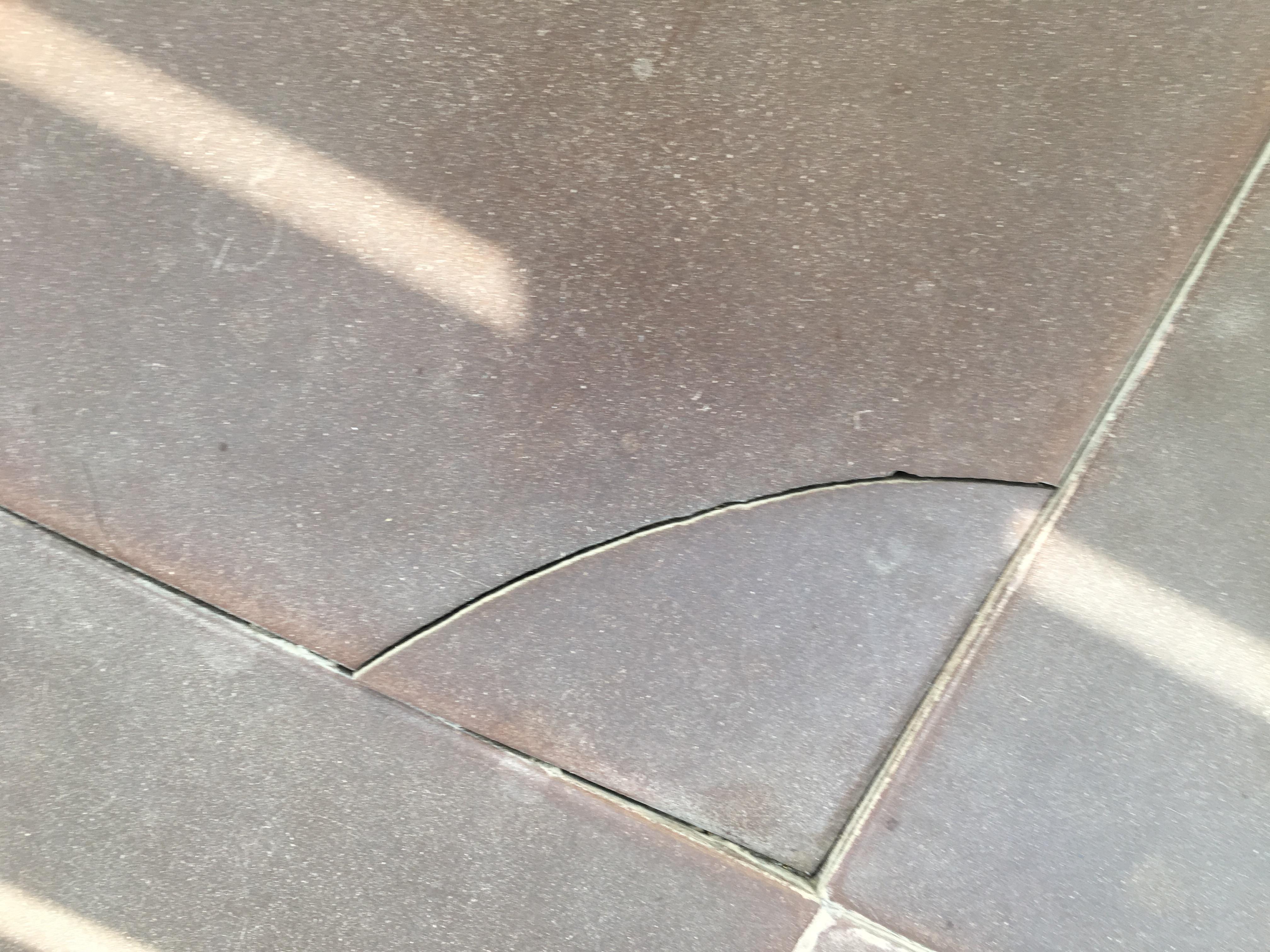 Cracked tile on balcony, so no bare feet.