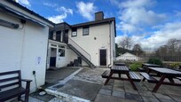A number of rooms are at the top of this metal staircase in beer garden. Be aware in case of mobility issues. Slippery when wet!