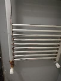Rusty element in bathroom,