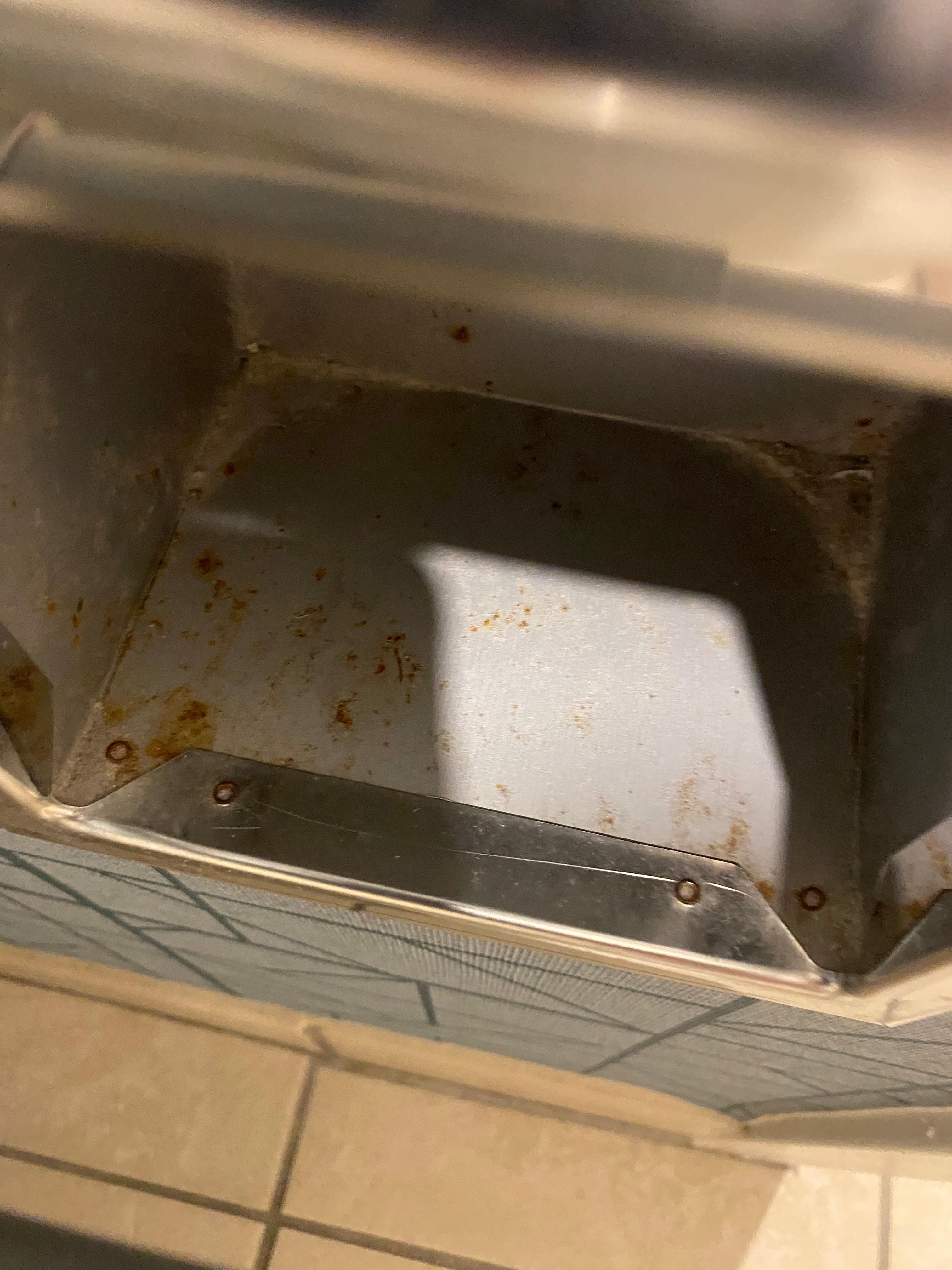 Rusty toilet roll holder