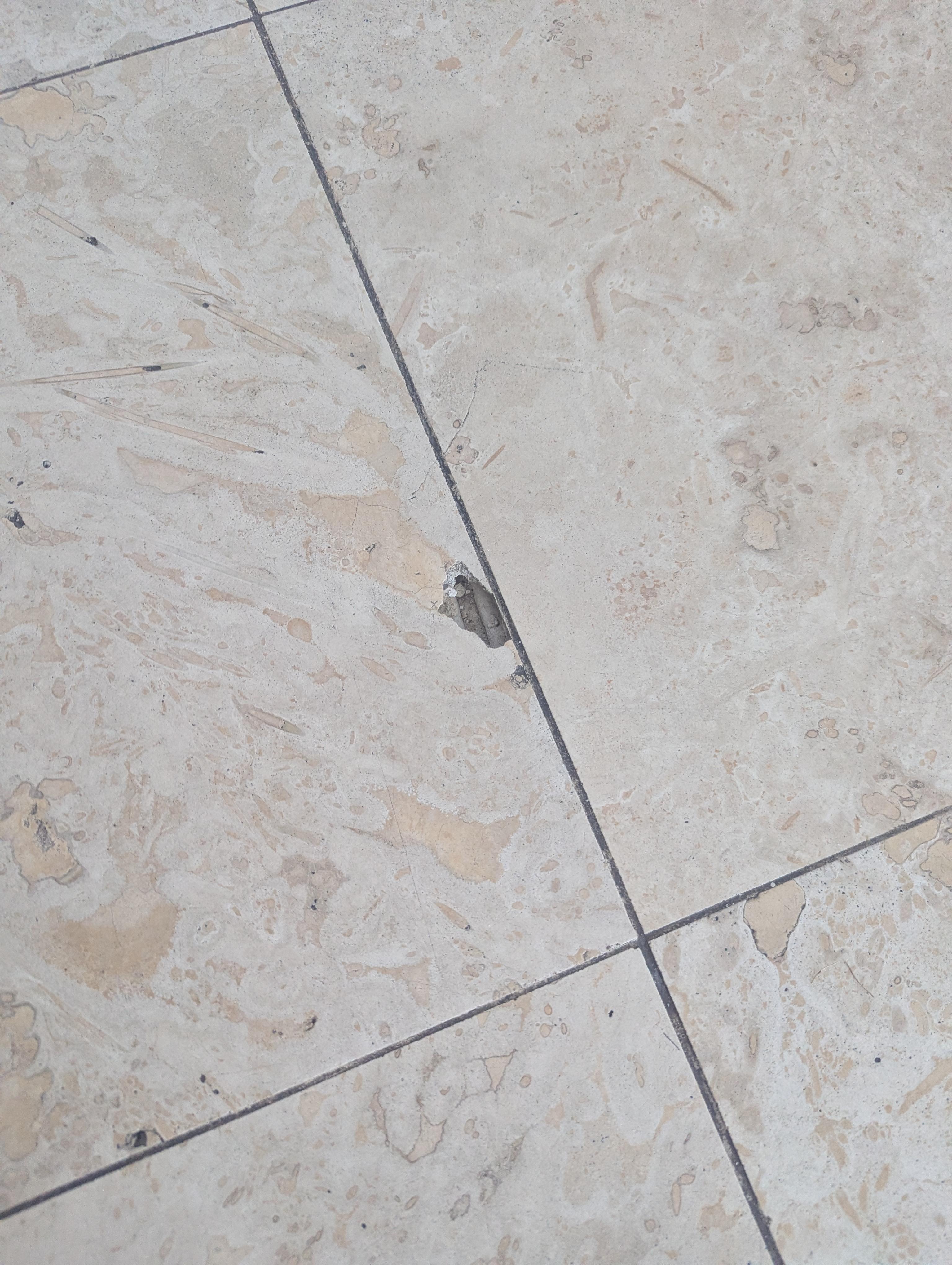 Hole in tile