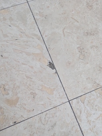 Hole in tile