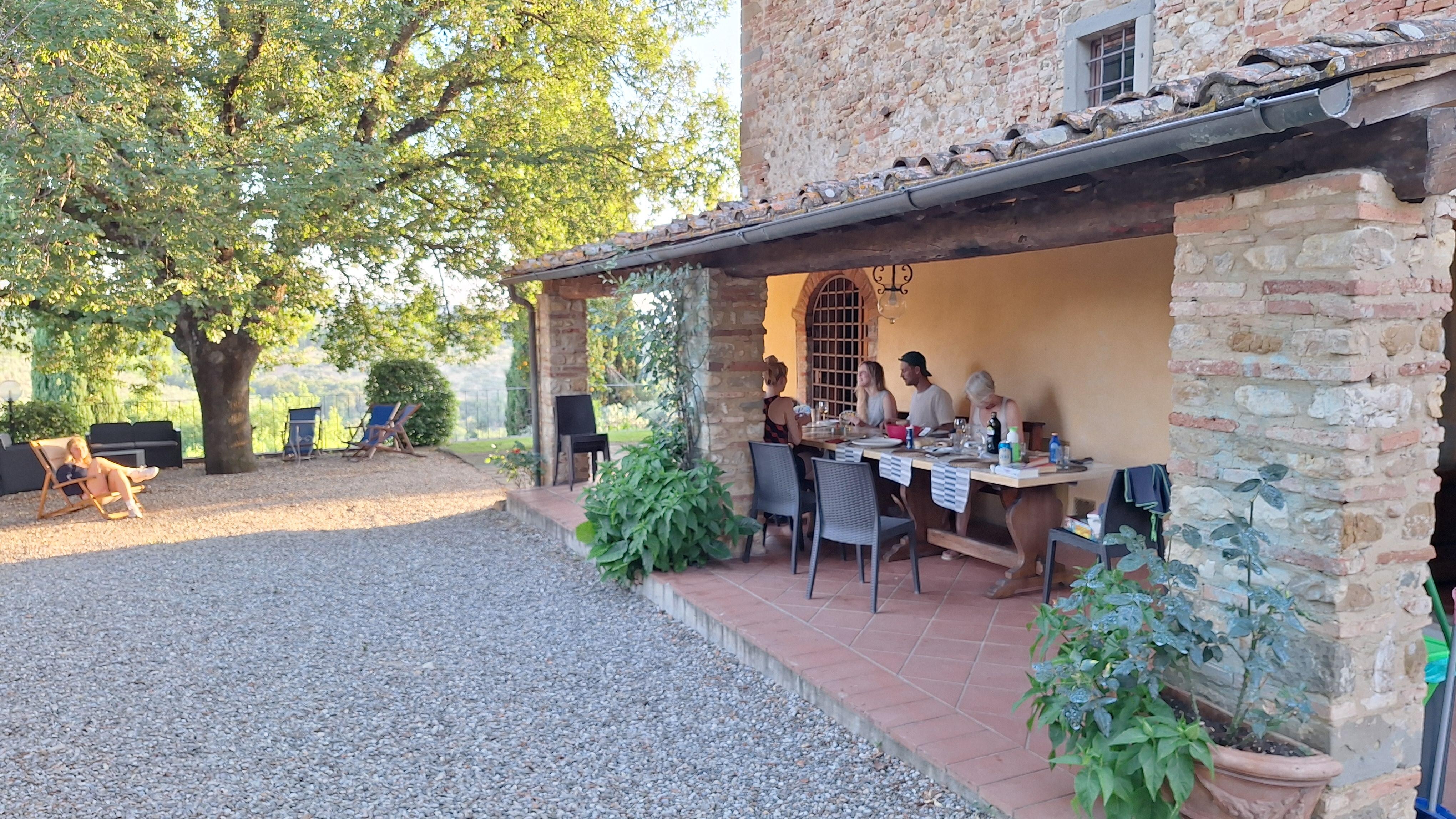 The outdoor table next to the kitchen