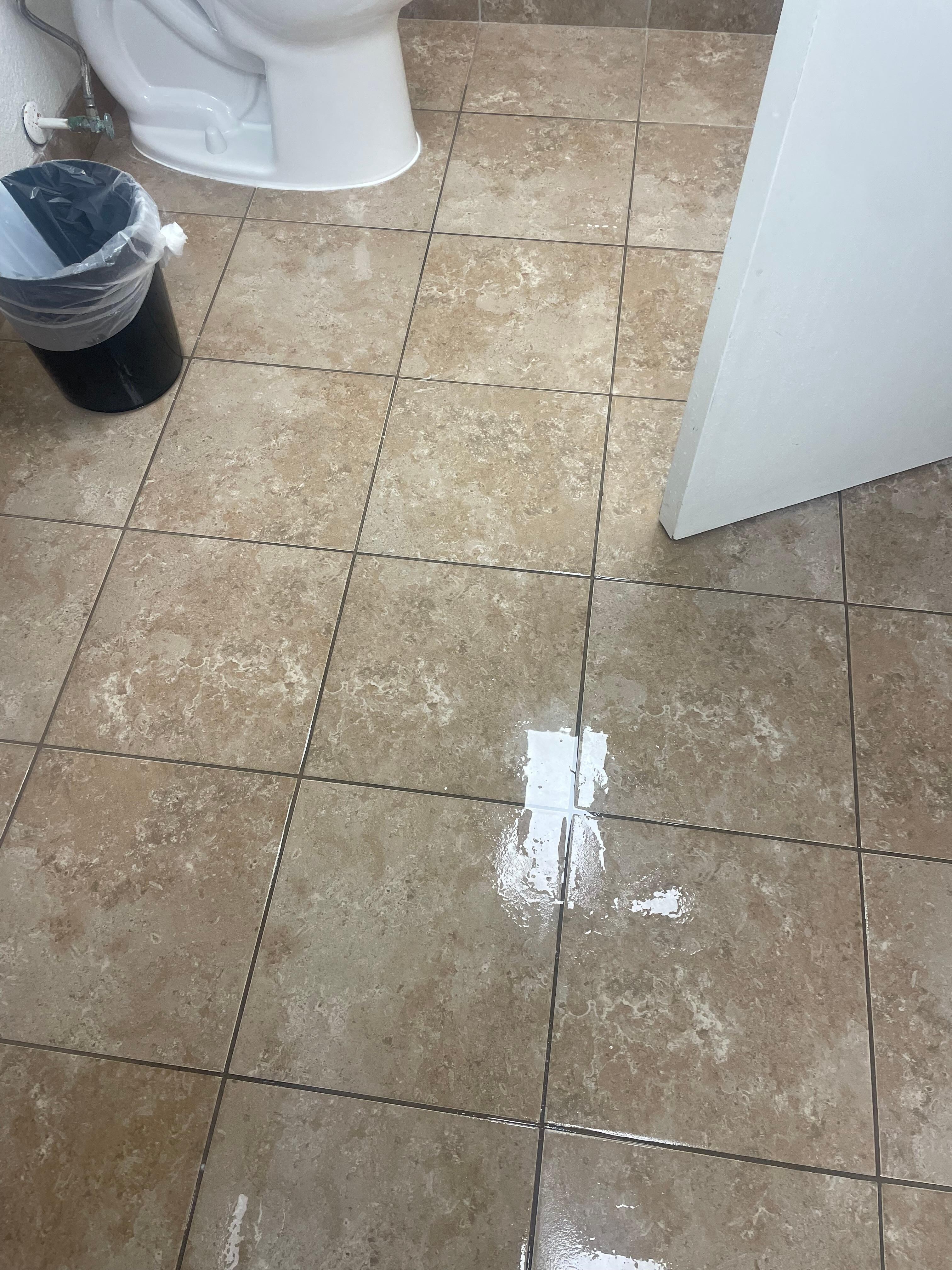 Flooded bathroom in the middle of the night on our first night 