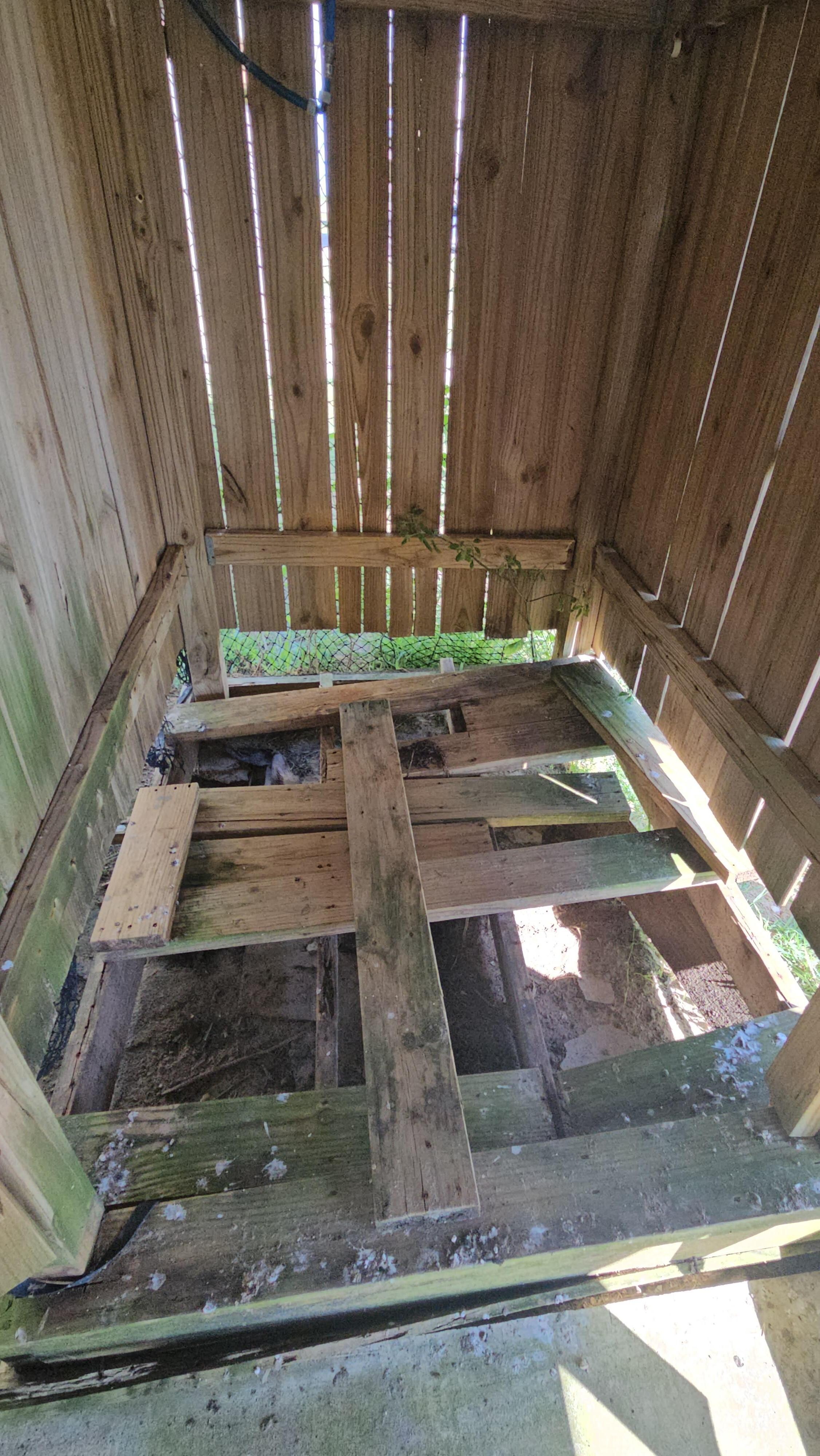 Missing boards & exposed rusty nails in the outside shower area. 
