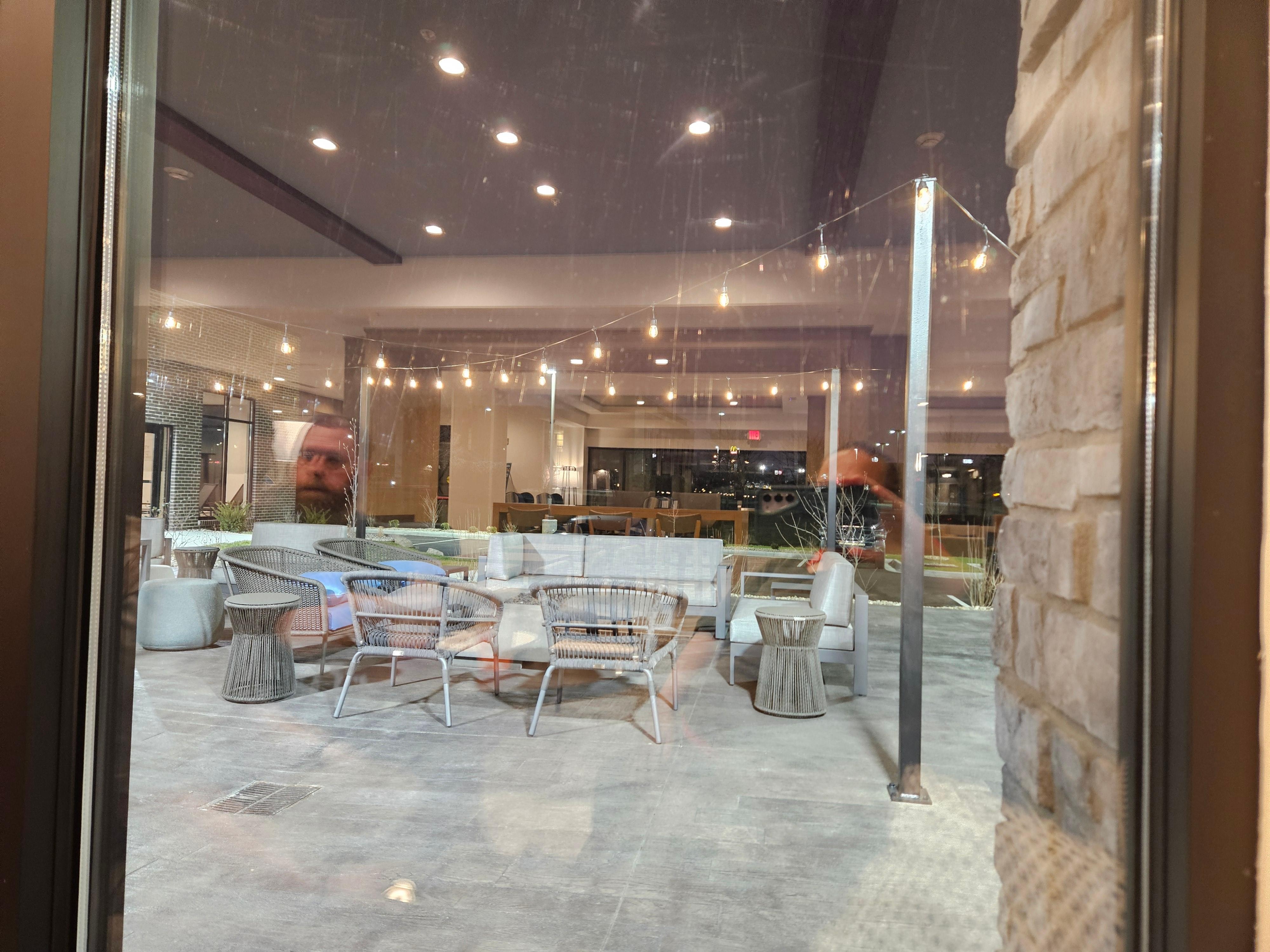 Out door seating area with grills .