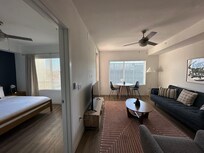 Nice big living room that also leads to balcony.