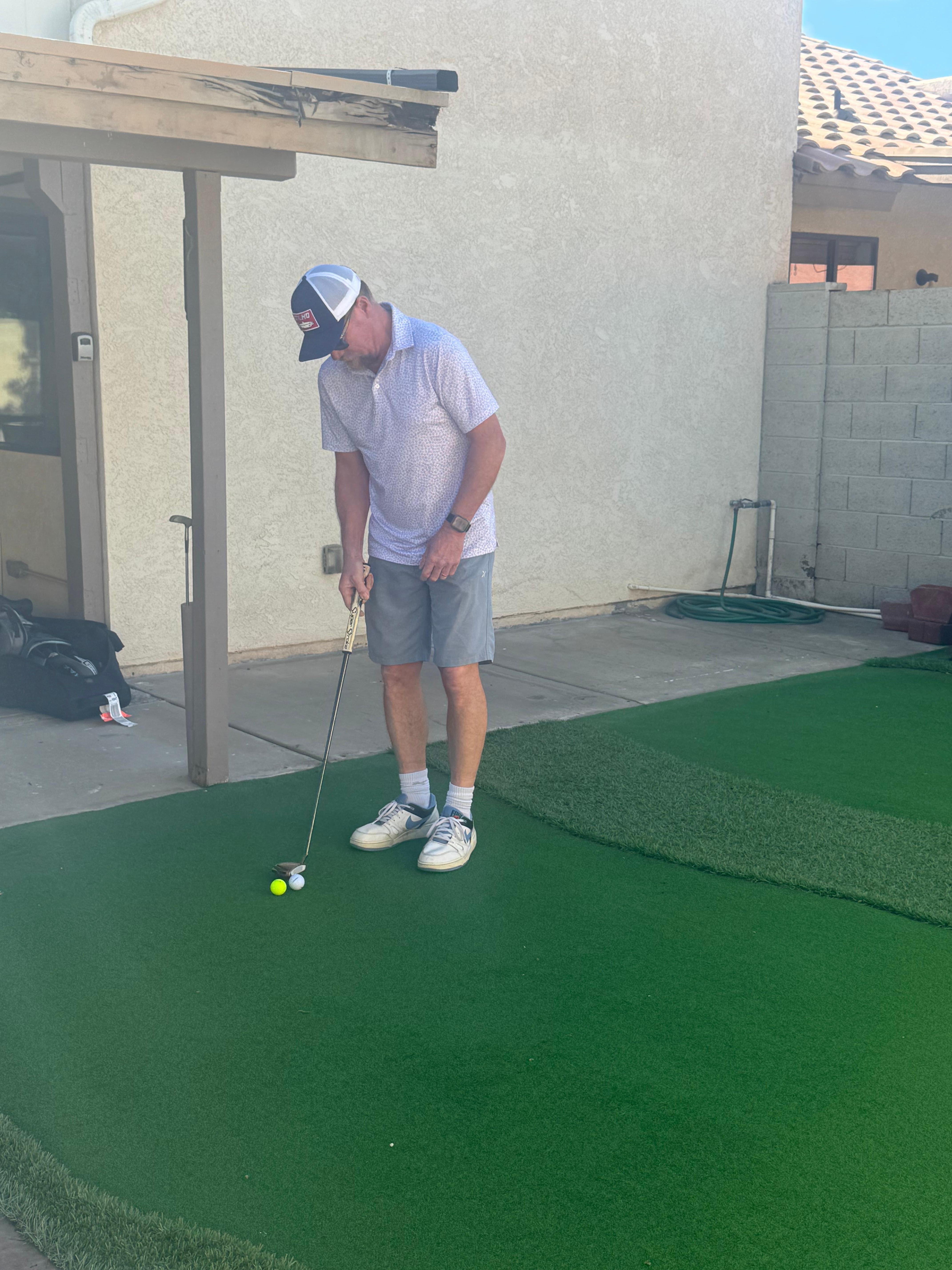 fun putting green out back!