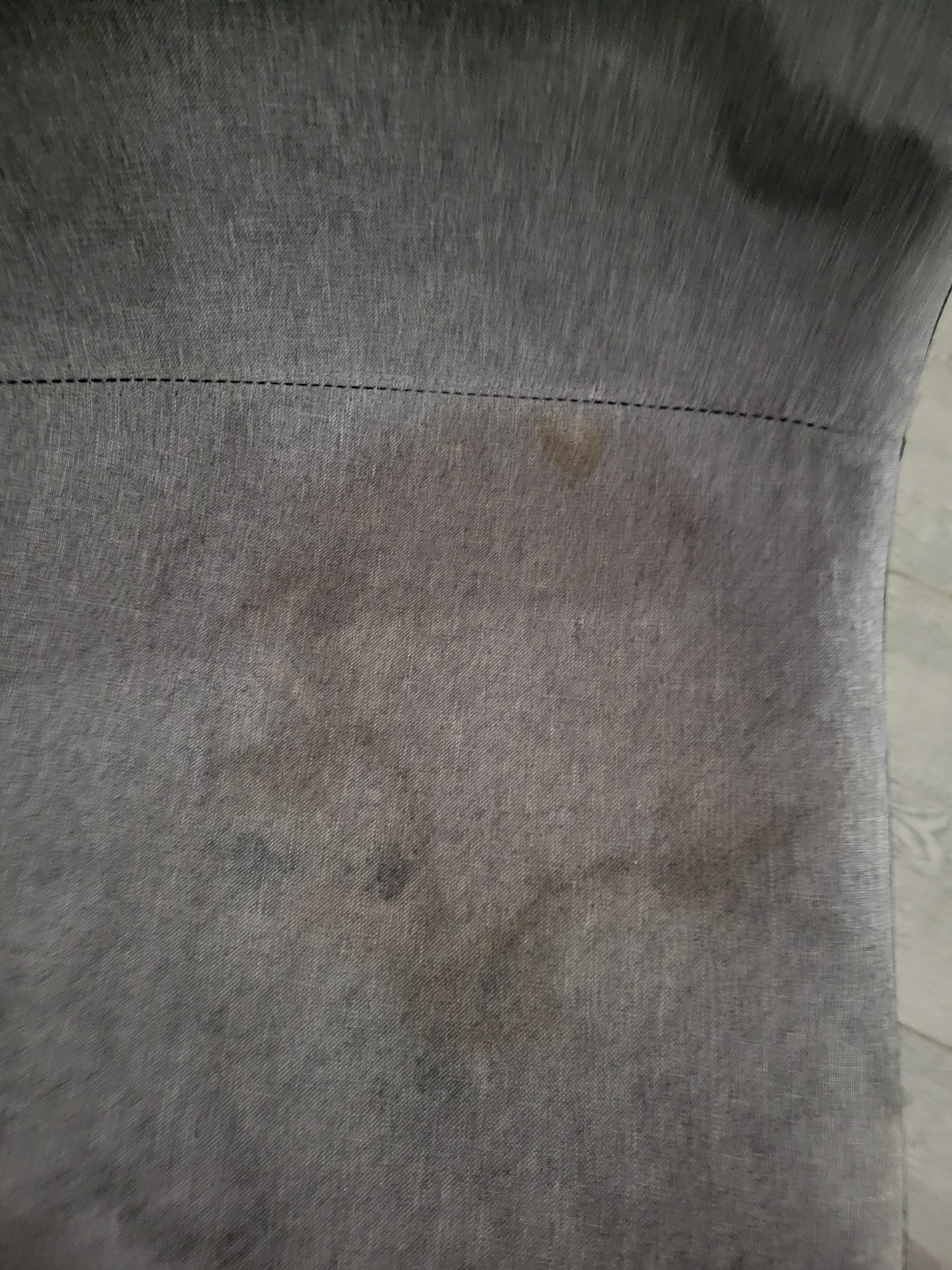 This is a chair that looks as if someone with diarrhea day on it. 