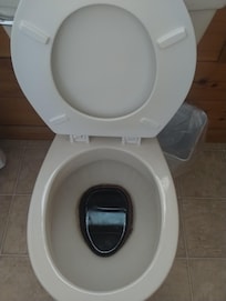 2 commodes had filthy water in the bowl