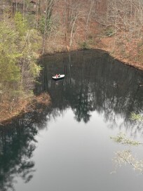 Watching our son and grandkids fish from the third-story deck.