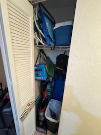 Beach amenities-chairs, 1snorkle, small coolers hard and soft shell). No umbrella. Iron board, broom, vacuum.