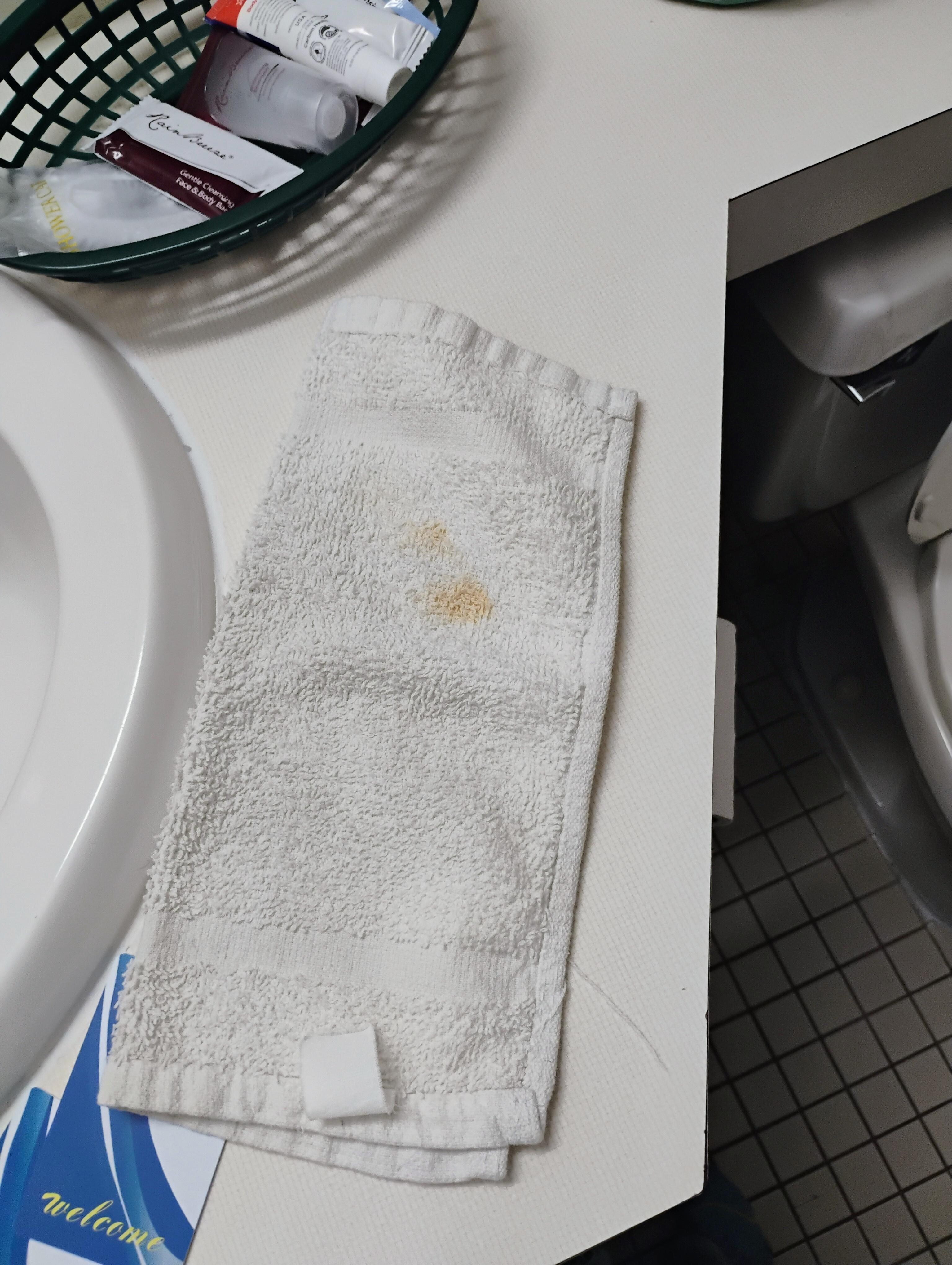 Stains on towels, looked like they weren't fresh