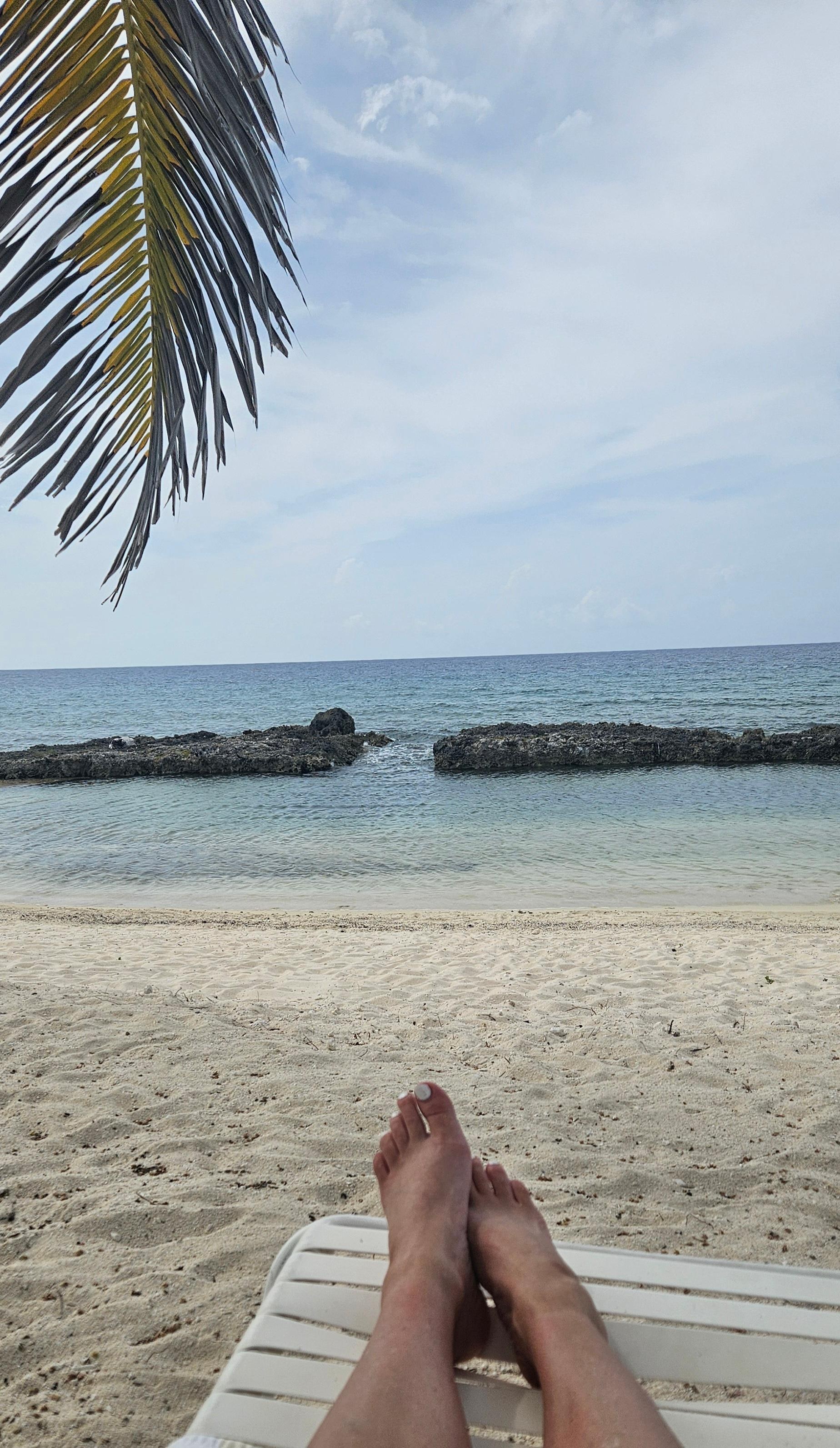 Laying by the beach reading