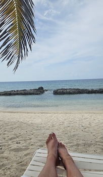 Laying by the beach reading