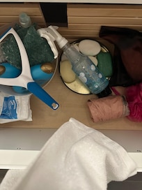 Messy, dirty drawers with old filthy sponges and used bars of soap. Gross.