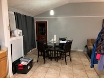 Dining area, leads to the deck and garage.