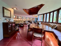 Dining room and living room in background