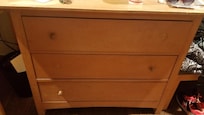 dresser holding up tv