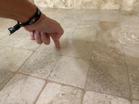 water pooling in shower