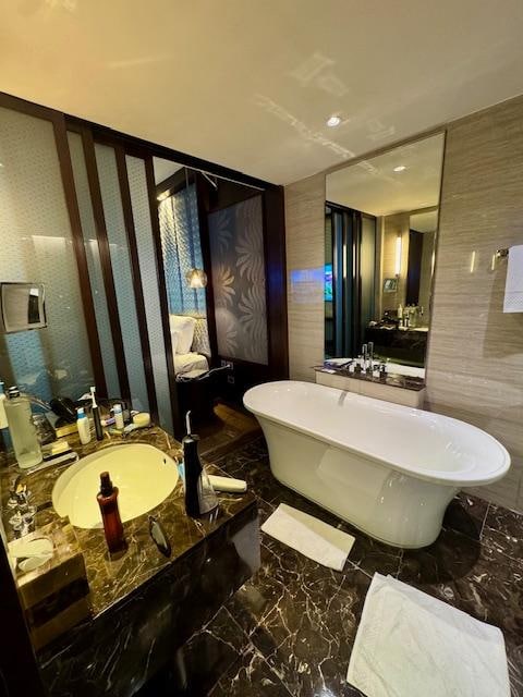 A photo of the amazing bathtub and the bathroom opens up to the bedroom. 