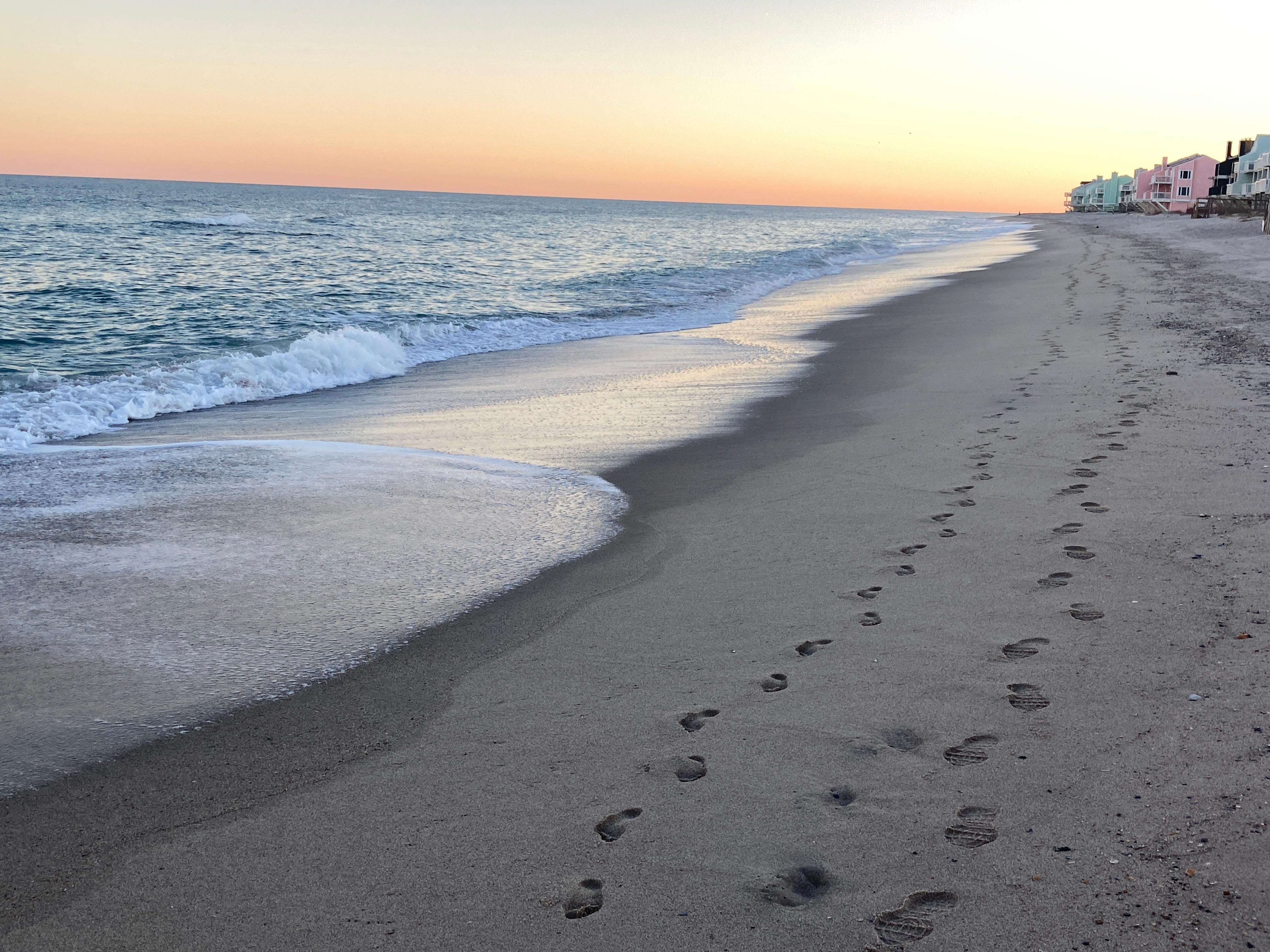 Just outside the unit walking on the beach.