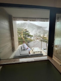 Hot springs bath tub and private balcony.