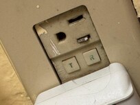broken metal in power socket